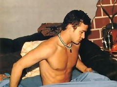 Justin Timberlake showing off his ripped chest and abs