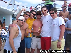 Party boys are on the beach having some fun with hot chicks