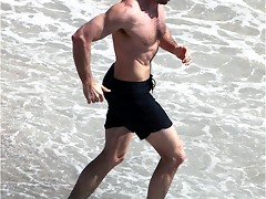 Paparazzi shots of Hugh Jackman showing his sexy torso