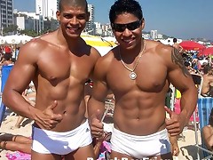 Young guys with hot bodies teasing well on the beach for fun
