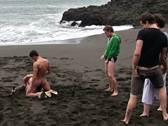 Amateur video of Micah Andrews being used and abused on a public beach