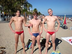 Hot young straight guys in wet trunks strips off at the beach